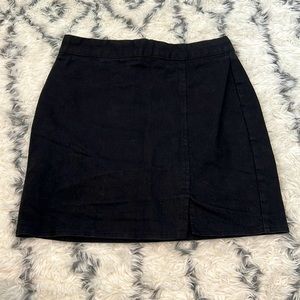 Black mini skirt with leg slit